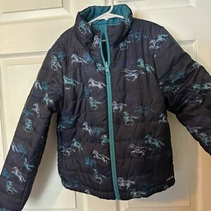Kerrits Kids Pony Tracks reversible puffer jacket.